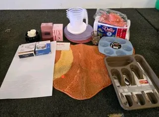 Assorted Household & Kitchen Lot – Plates, Organizers, Muffin Pan, Bath Mat, Sealed Perfume