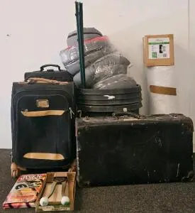 Mixed Lot: American Tourister Suitcase, Spinner Carry-On, Vintage Trunk, Hunter HEPA Filter, Silicone Oven Glove, Hand Tool, Sleeping Bag, Bubble Wrap, T-Posts, Buckets, Planting Pots (M)