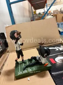 Lot of 12 Retired UC Football Bobbleheads