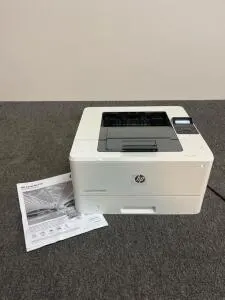 HP LaserJet Pro M402n Monochrome Laser Printer, 40ppm, Network & USB, SN: PHBHXH7962, turns on