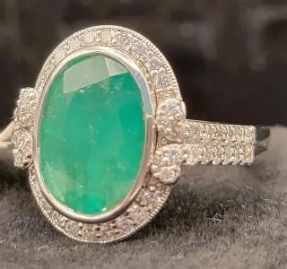 Oscar Friedman Platinum Ring with 3.60 ct Emerald and 0.60 ct Diamonds