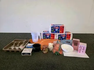 Assorted Household Lot: Paper Napkins, Perfume, Kitchenware, Rug, Glassware, Organizer, Bowls