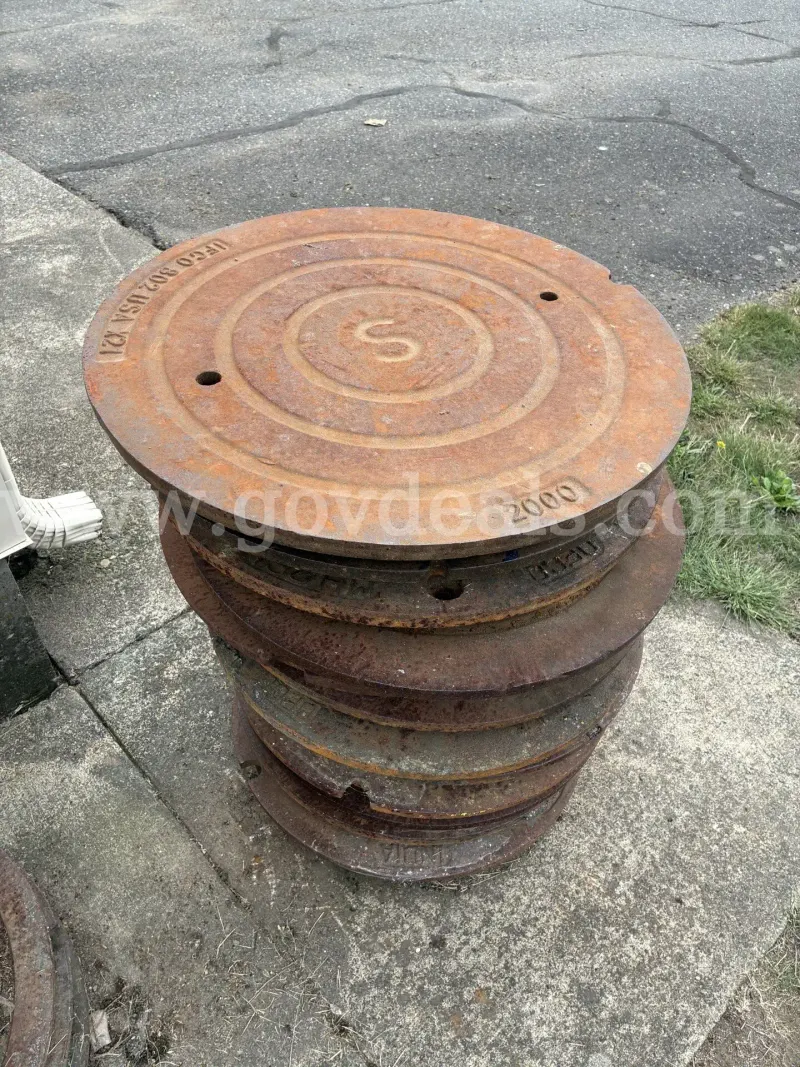 Mix of Sewer and Strom Water Manhole Lids