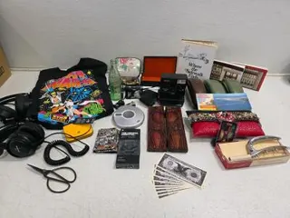 Mixed Vintage Collectibles Lot: Star Wars Shirts, Sony Walkman, Polaroid Camera, Skullcandy Earbuds