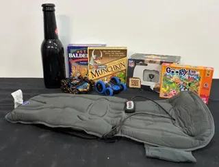 Mixed Lot: Conair Massage Pad, NFL Raiders Toaster, 2 RC Cars, Bottle Bank, Board Games, Puzzle