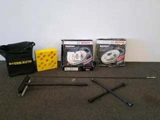Bosch QuietCast 28011449 Front Brake Rotors, 300mm, for Hyundai/Kia Models, tire iron, squeegee, antenna, camper/ tire blocks.