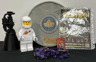 Beatles "Lost Concert" Poster, LEGO Spaceman, Bell 16mm Film, Rocket Model, Resin Domino Set Lot