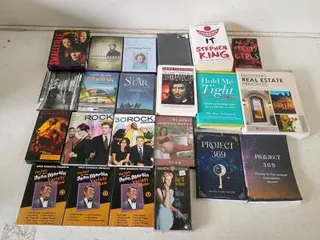 Large Mixed Media Lot: Books, DVDs, VHS, PS3 Game – Stephen King, Smallville, 30 Rock, Yoga