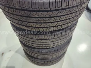 A set of 4 used Michelin Latitude Tour all season tires. Size 235/70R16