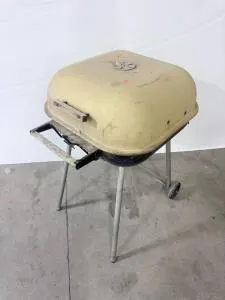 Vintage Square Charcoal Grill with Yellow Lid, Black Base, and Wooden Handle