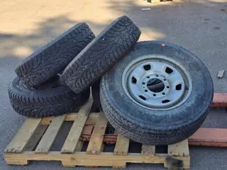 4 Hankook Winter i*Pike 215/65R16 Studded Tires w/ Rims + 1 Firestone 245/75R16 Steel Rim
